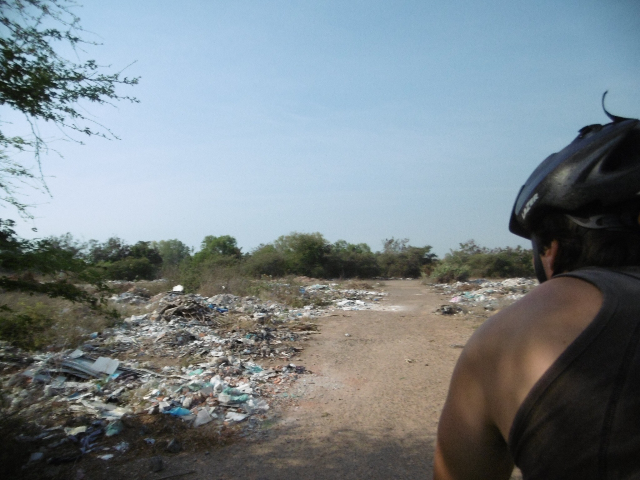 A rubbish-filled road in Vietnam